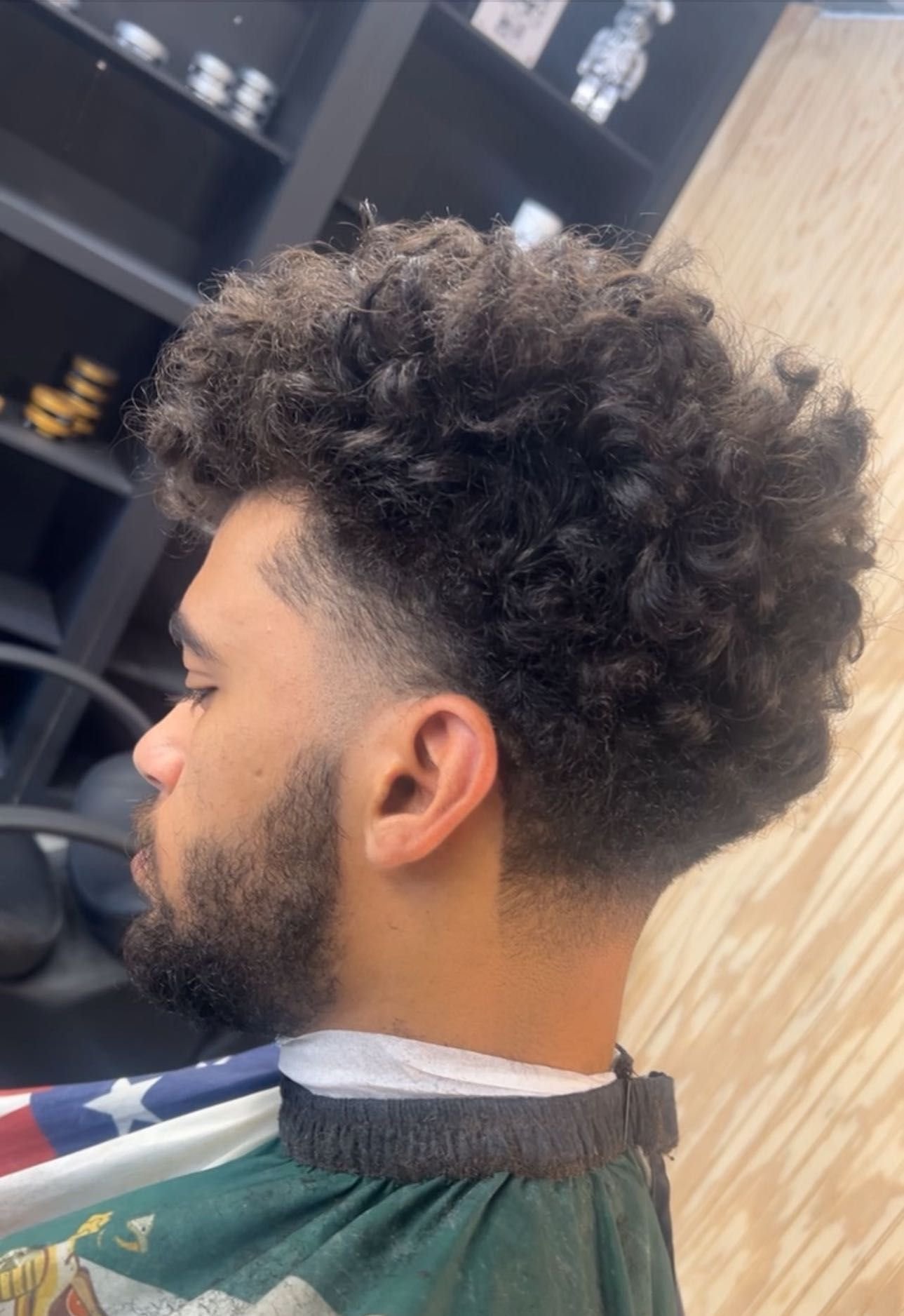 Curly fade haircut at Faded Laces